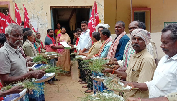 workers-protest-with-grass