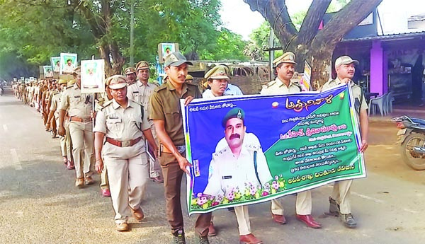 అటవీశాఖ అధికారి హత్యకు నిరసనగా ర్యాలీ