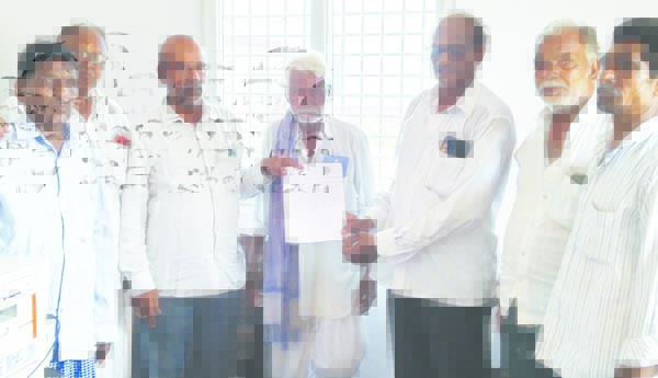 మొక్కజొన్న కొనుగోలు కేంద్రం ఏర్పాటు చేయాలి