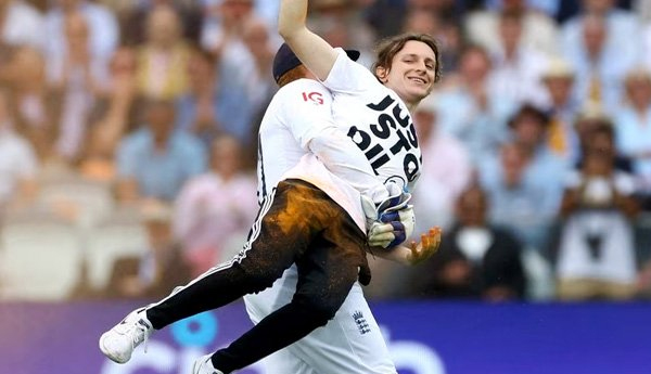/Disruption-of-the-match-Bairstow-lifted-the-protester