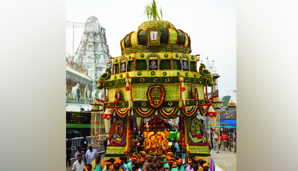 పుష్పపల్లకిపై గోవర్థనుడుగా మలయప్ప